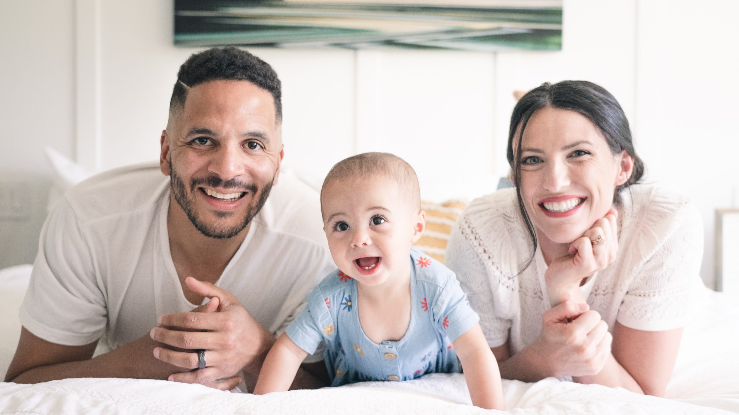 Kinland Smiles on Bed